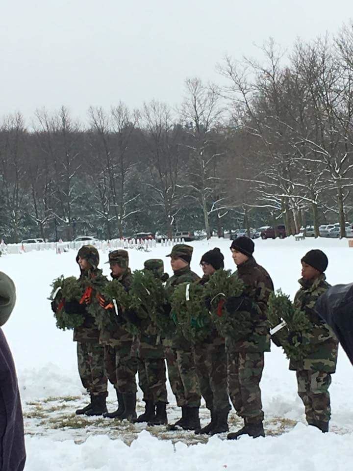 Royal Charter Composite Squadron, Civil Air Patrol, US Air Force Auxiliary Cadets bear ceremonial wreaths that will be placed in honor of six Military Branches and all POW MIA at the State Veterans Cemetery in Middletown on national Wreaths Across America