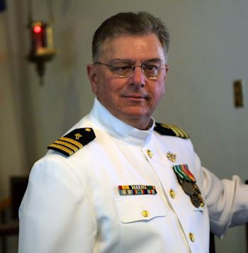 <i class="material-icons" data-template="memories-icon">stars</i><br/><br/><div class='remember-wall-long-description'>Ken Puccio, CDR, CHC, USN for his 28 years of service as a Navy Chaplain.</div><a class='btn btn-primary btn-sm mt-2 remember-wall-toggle-long-description' onclick='initRememberWallToggleLongDescriptionBtn(this)'>Learn more</a>