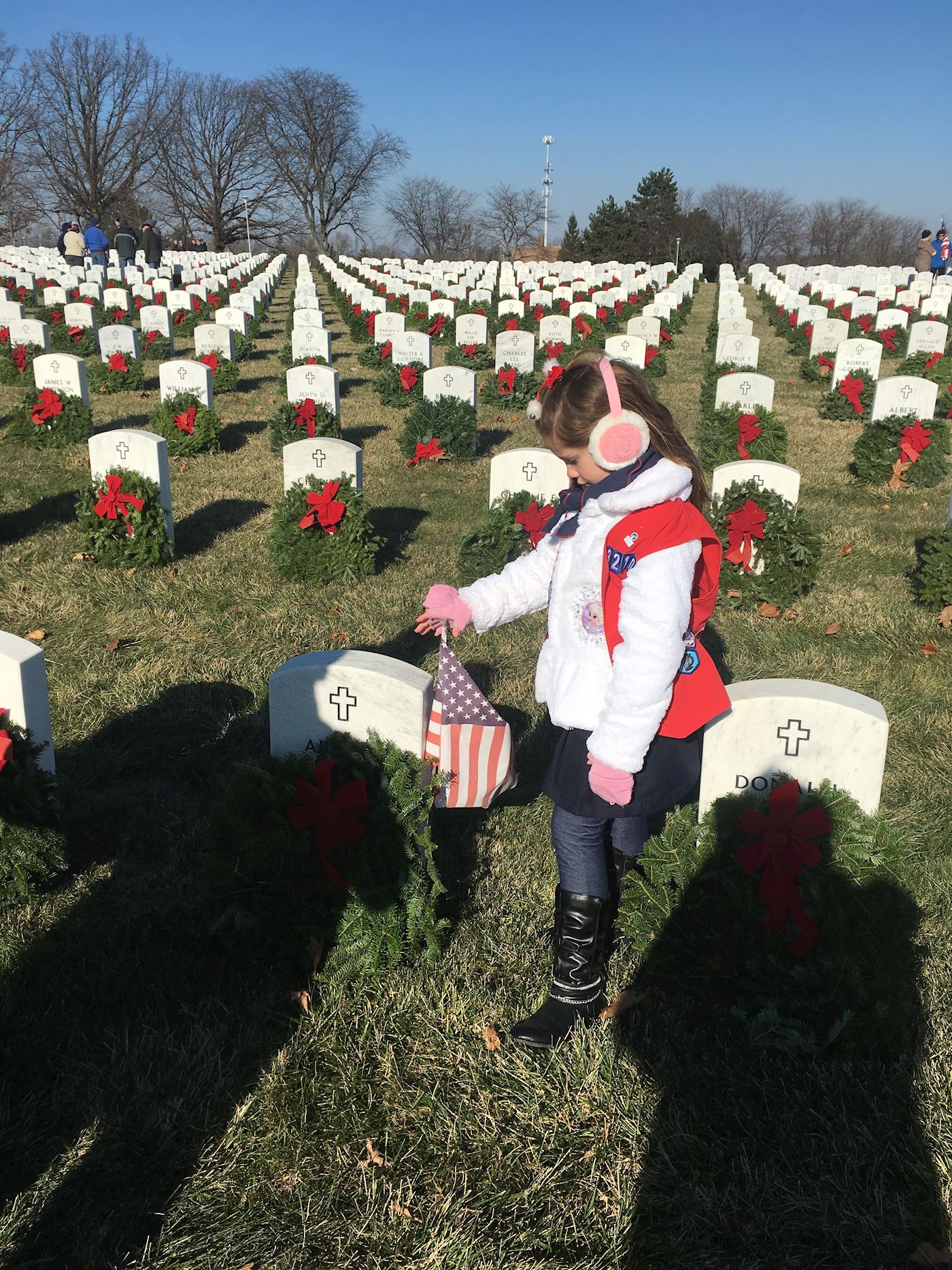 Speaking the name of the veteran out loud and praying for his/ her family are integral parts of laying the wreaths.