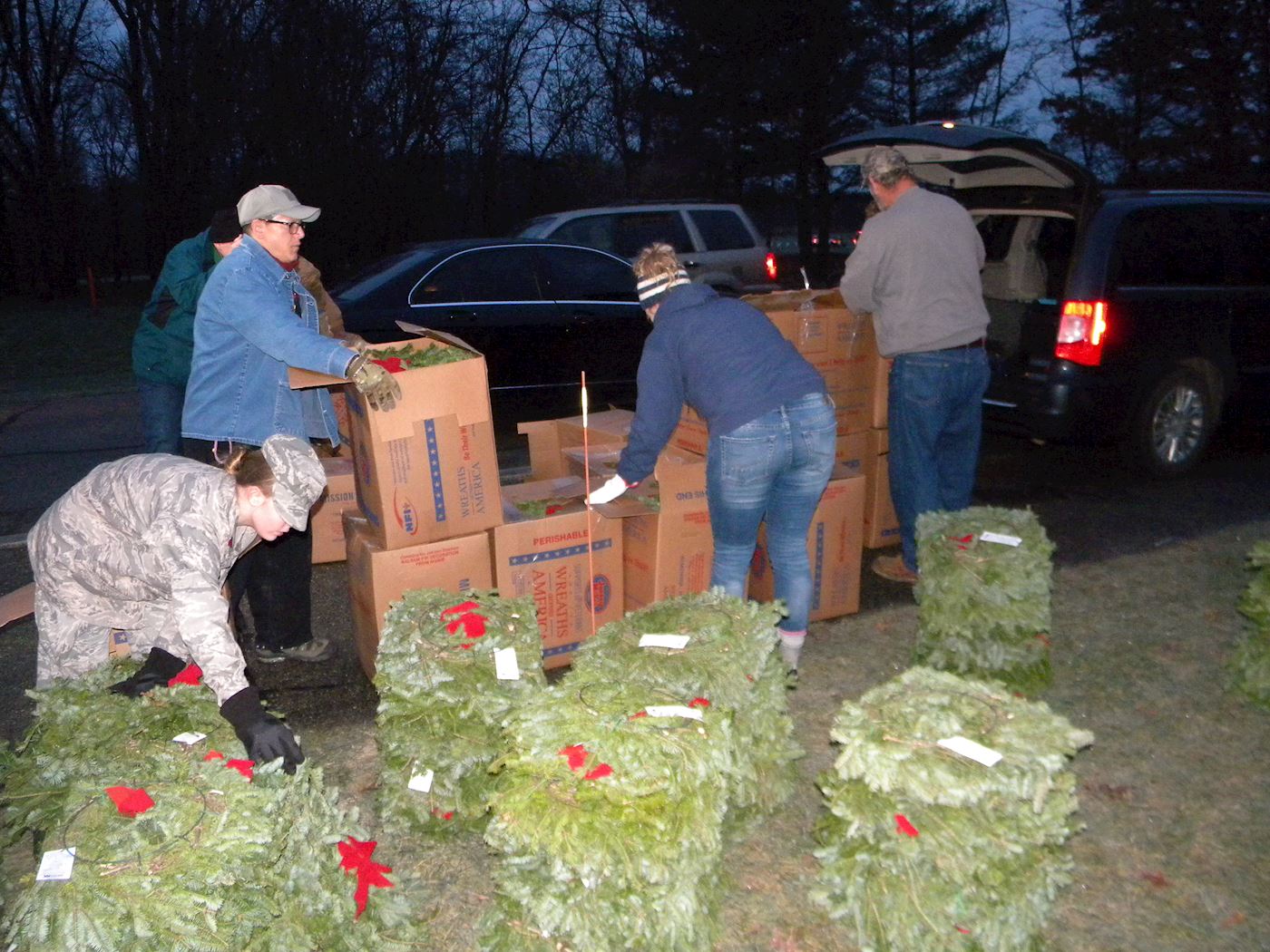 Pre-dawn, unloading and unpacking the wreaths