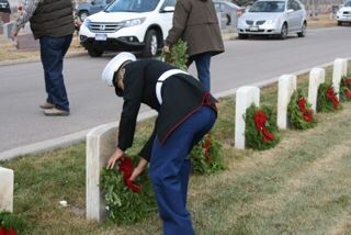 Northridge JR ROTC Marine laying wreaths at Soldier's Field