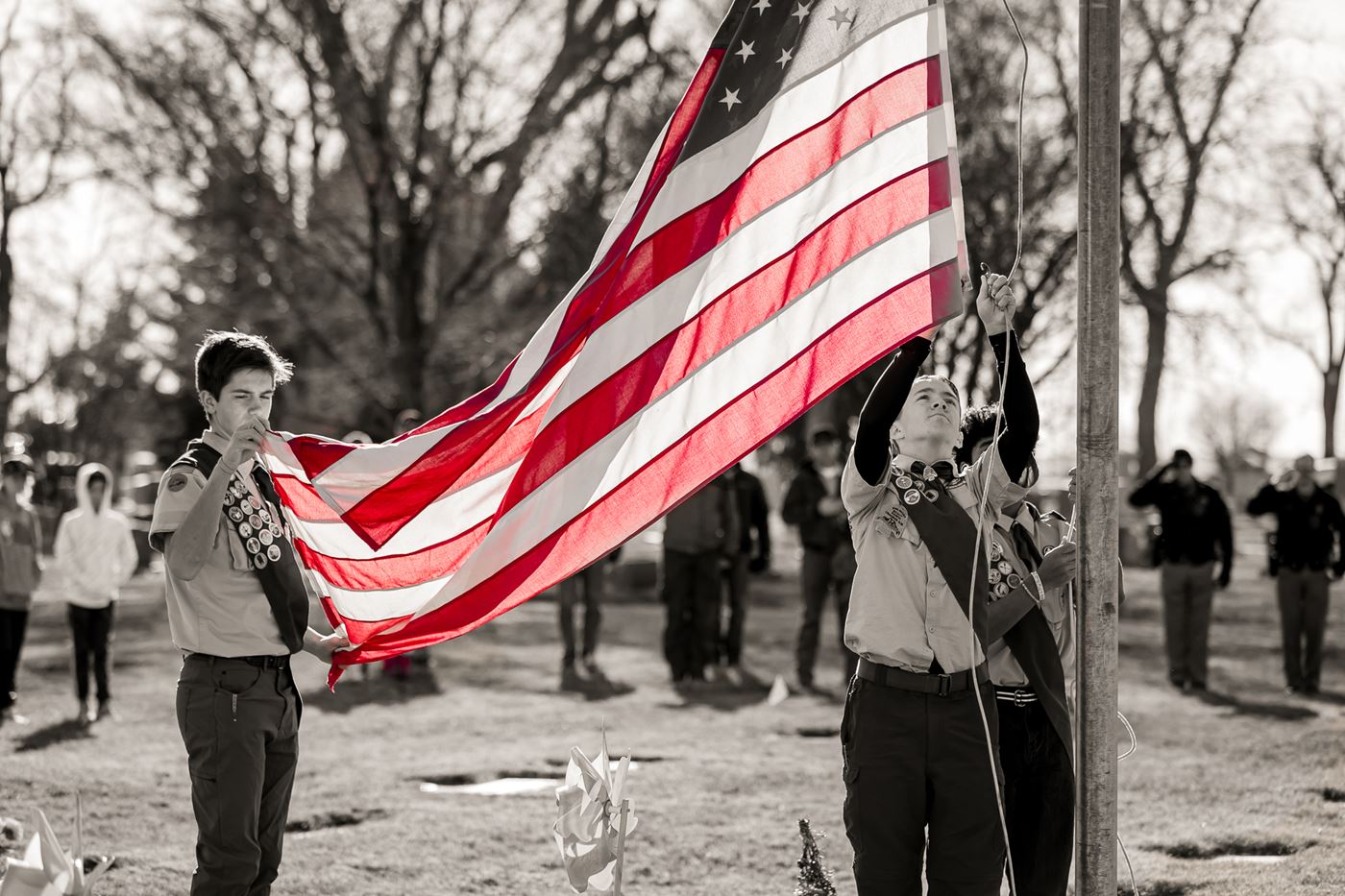 Scouts with Troop 6 Berthoud raising our American Flag