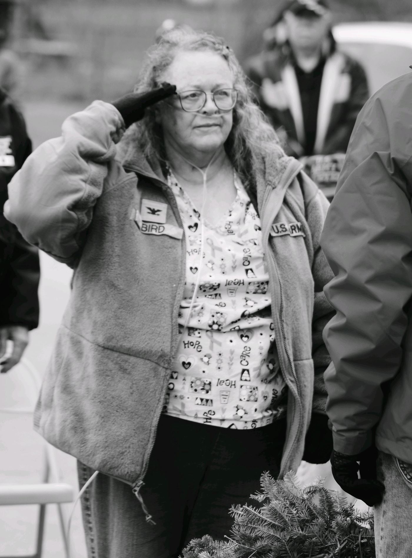 Jo Bird Air Force Veteran Vietnam, salutes the Space Force Wreath.<br>