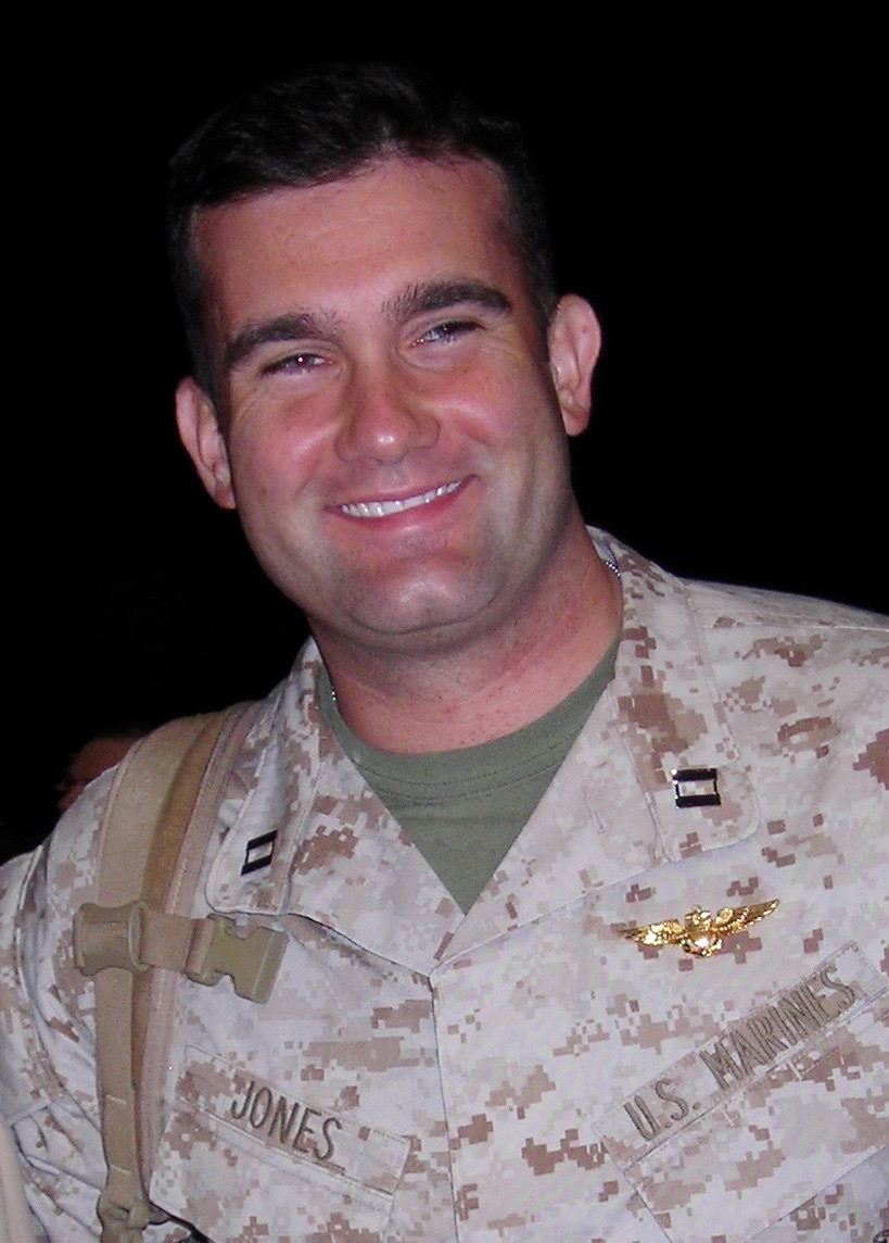 <i class="material-icons" data-template="memories-icon">chat_bubble</i><br/>Eric Jones<br/><div class='remember-wall-long-description'>In loving memory of my son, Capt. Eric A. Jones, USMC.</div><a class='btn btn-primary btn-sm mt-2 remember-wall-toggle-long-description' onclick='initRememberWallToggleLongDescriptionBtn(this)'>Learn more</a>