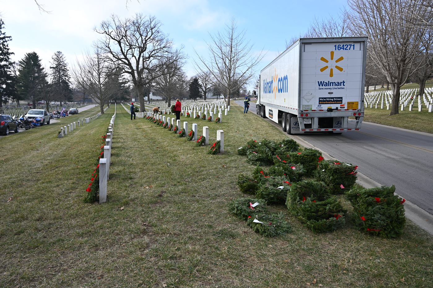 Volunteers at the Fort Leavenworth National Cemetery unloaded a Walmart truck full of wreaths for the Dec. 19, 2020 Wreaths Across America Day.