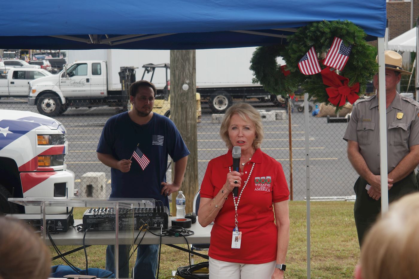 Bennett DEO, Marcia Taylor addresses the crowd after the Wreaths of Honor Ride