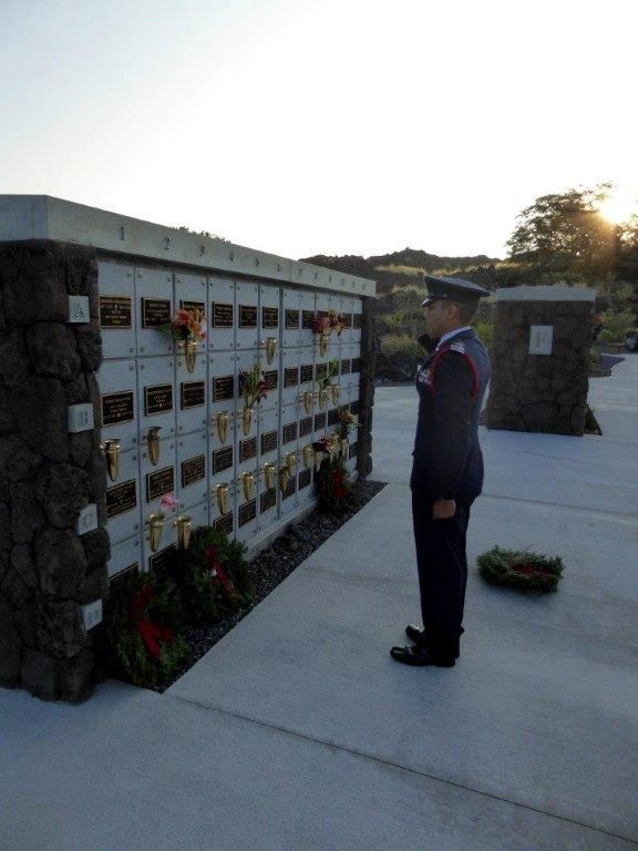 C/2ndLt Gonzalez pays his respects to one of our own, Capt Andrea Rollman.