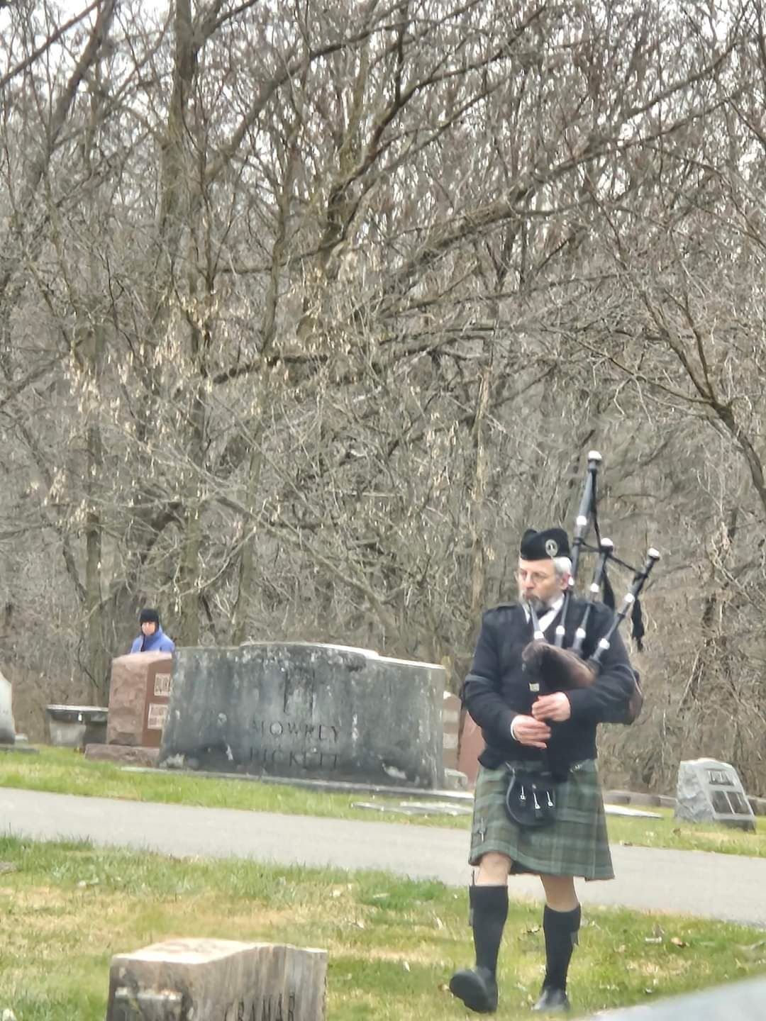 Stuart B. Hatfield, walks the roads around Greenhill Cemetery playing his Big Pipes.&nbsp; Pretty chilly day, he never stopped for over two hours!<br>