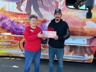 Marie Presents Driver Chris with a "Goodies Box"