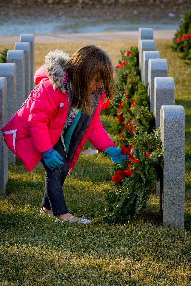 Helping place wreaths at the Veterans Memorial Cemetery, Grand Junction, CO