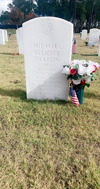 <i class="material-icons" data-template="memories-icon">account_balance</i><br/>Michael  Saxton , Navy<br/><div class='remember-wall-long-description'>
  Of Petty Officer 2nd class Michael Elliott Saxton</div><a class='btn btn-primary btn-sm mt-2 remember-wall-toggle-long-description' onclick='initRememberWallToggleLongDescriptionBtn(this)'>Learn more</a>