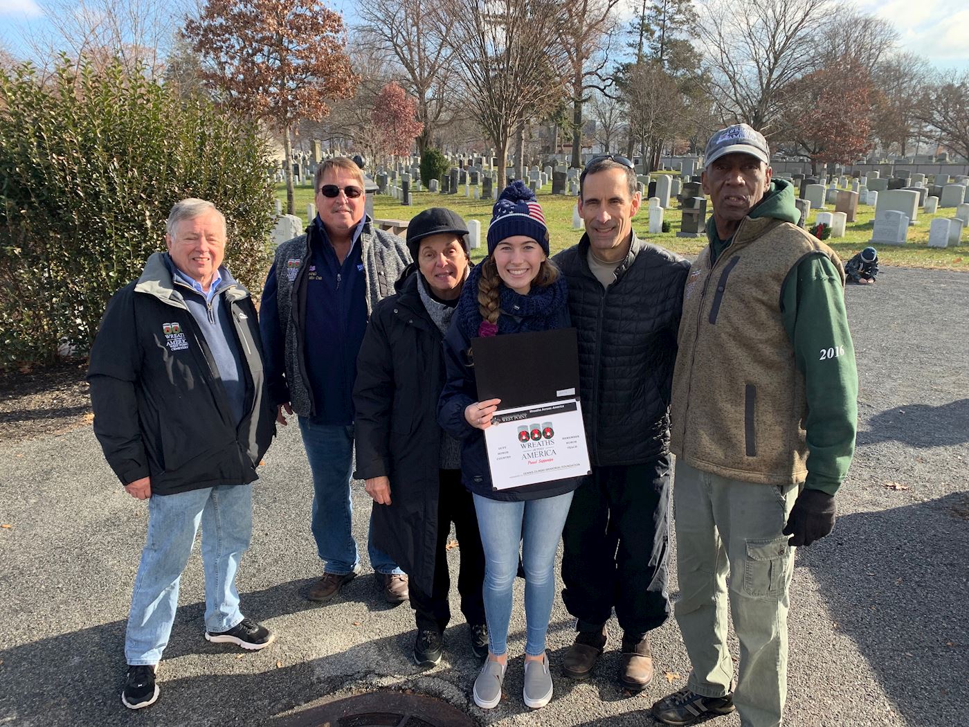 Jordan and Wreaths Across America truck drivers and coordinators. To the left of Jordan is Jackie McNally, the coordinator of WAA at West Point!