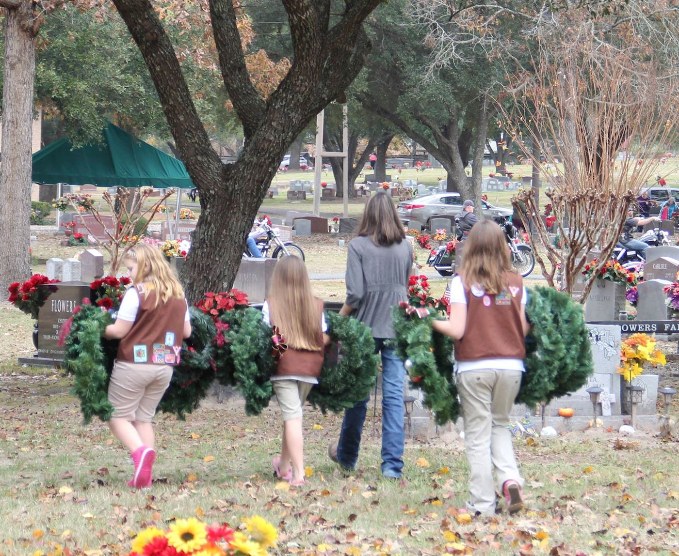 Girls Scouts (Brownies) heading out with their wreaths. 