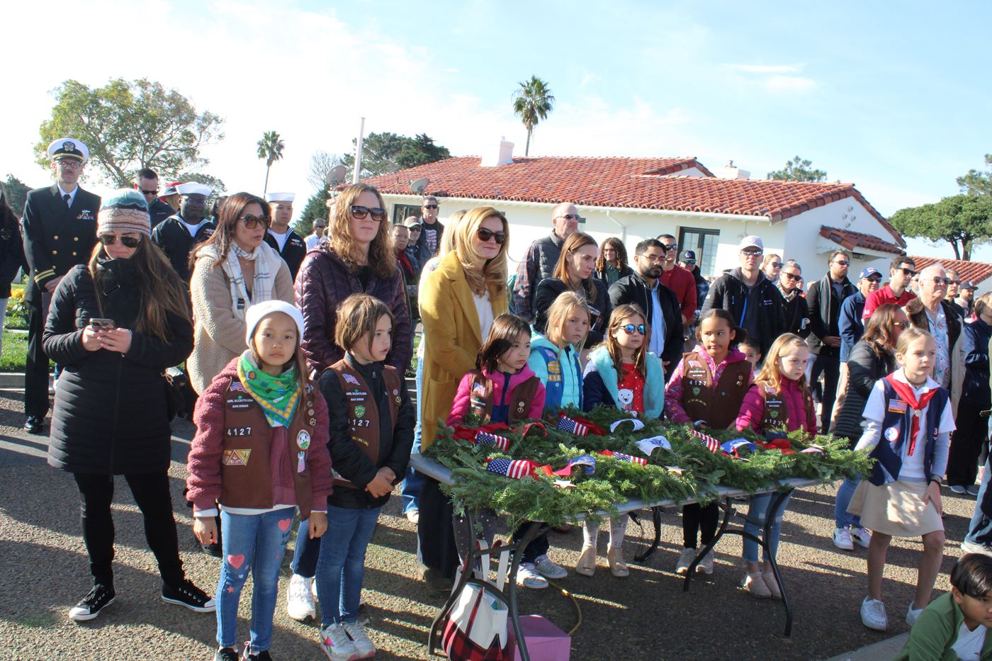 BROWNIES CARE FOR CEREMONIAL WREATHS FOR PRESENTATION