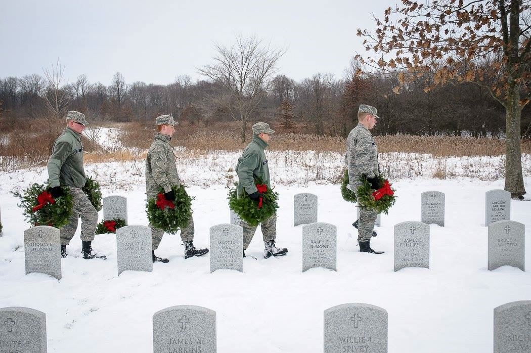 Lead by Cadet Master Sergeant Joshua Vannoy, a team of Skyhawks takes wreaths to be laid at some of the gravesites.