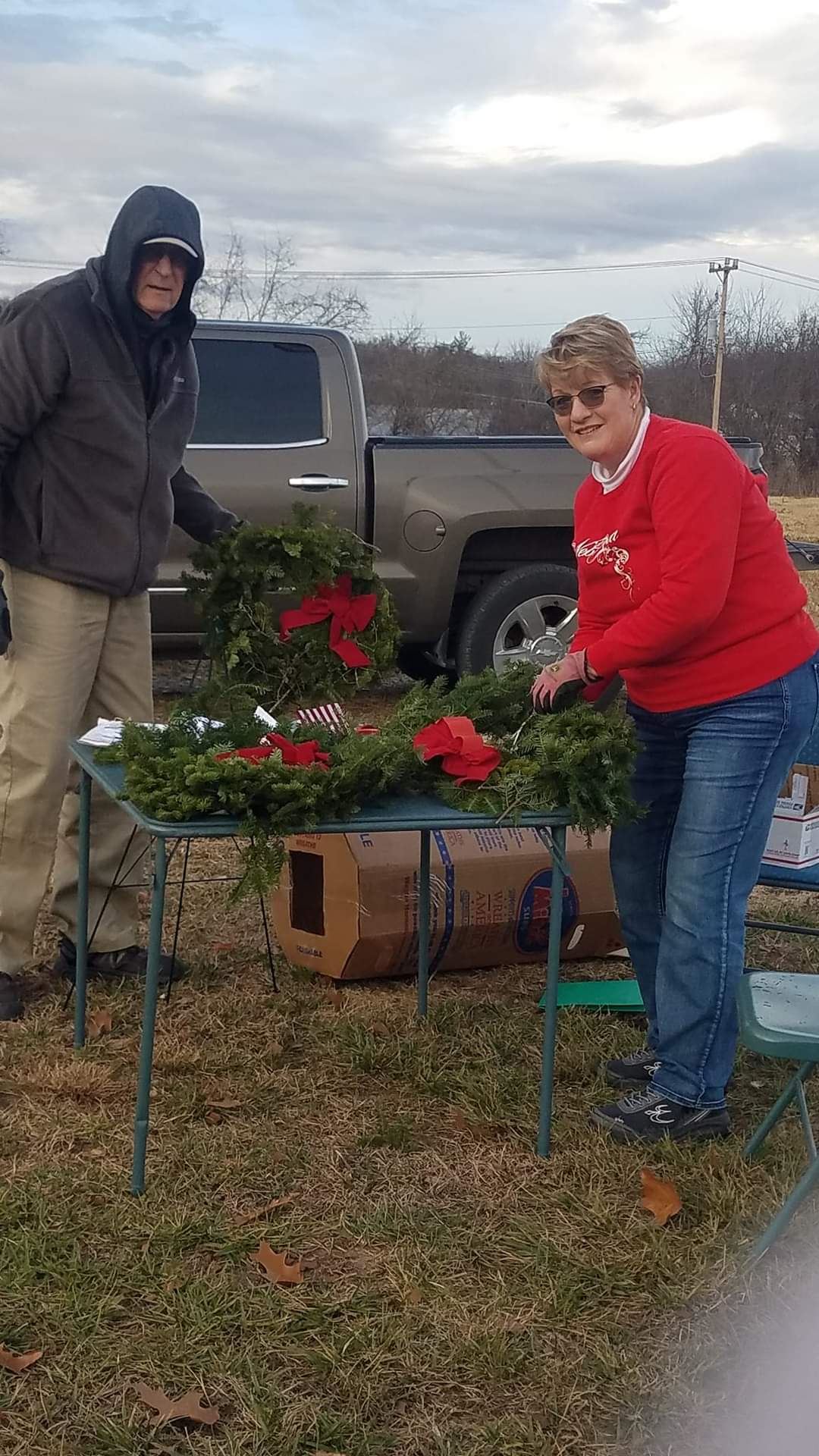 Picking up wreaths and recycling them