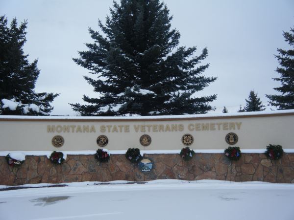 Following the Post Chapel ceremony, wreaths are placed at Montana State Veterans Cemetery, Fort Harrison.