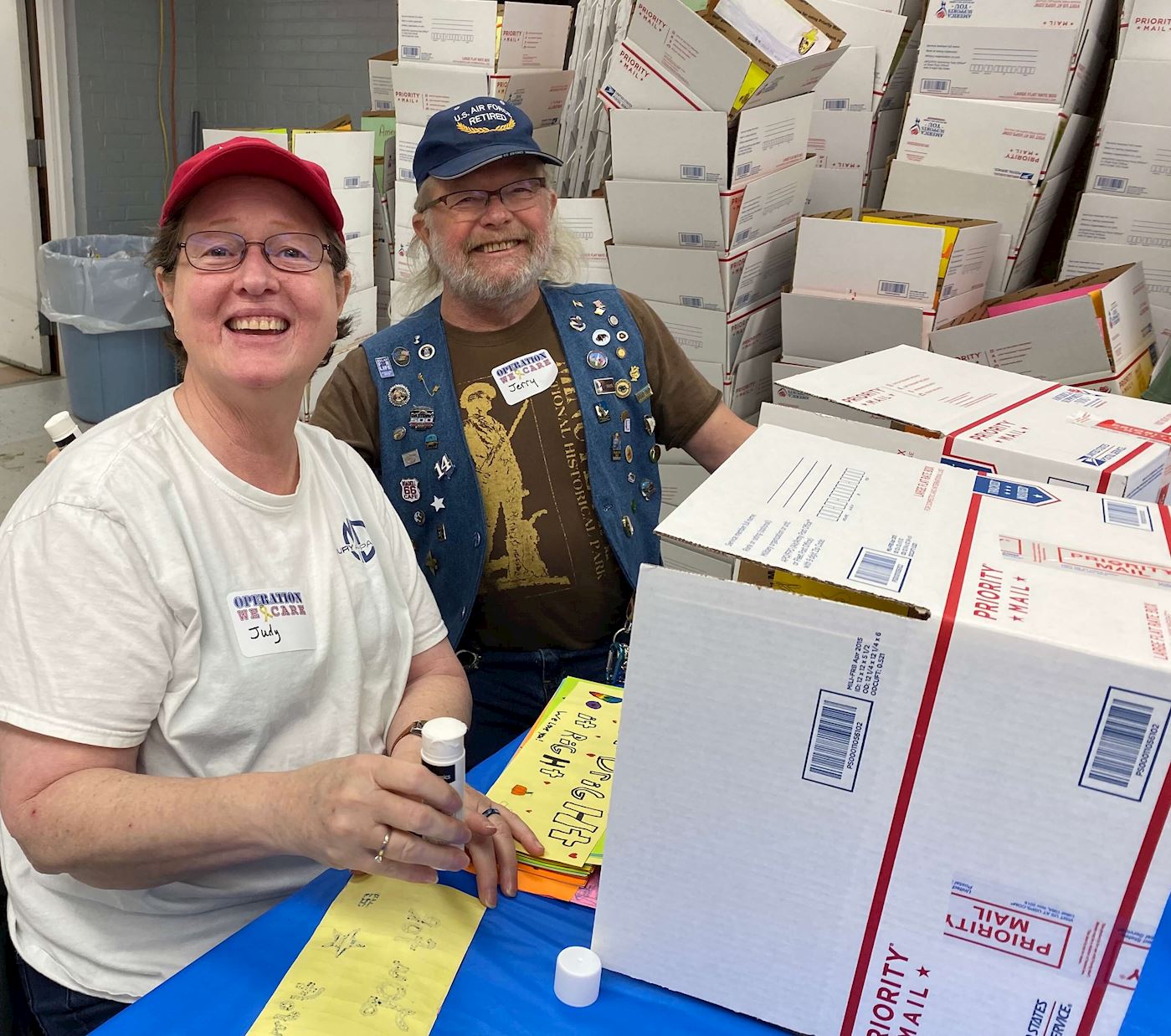 Jerry Halter, USAF Veteran Retired and Judy Halter assembling boxes