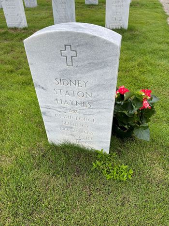 <i class="material-icons" data-template="memories-icon">stars</i><br/>Sidney Haynes<br/><div class='remember-wall-long-description'>In honor of Sidney Haynes and his wife Vera buried at Florence National Cemetery, Love your family</div><a class='btn btn-primary btn-sm mt-2 remember-wall-toggle-long-description' onclick='initRememberWallToggleLongDescriptionBtn(this)'>Learn more</a>