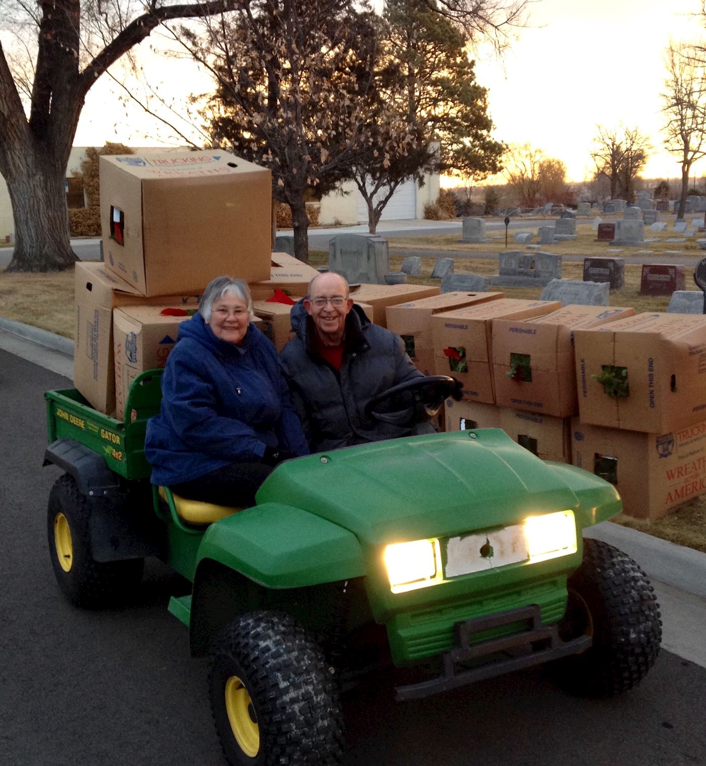 Mike and Linda helping distribute cases of wreaths
