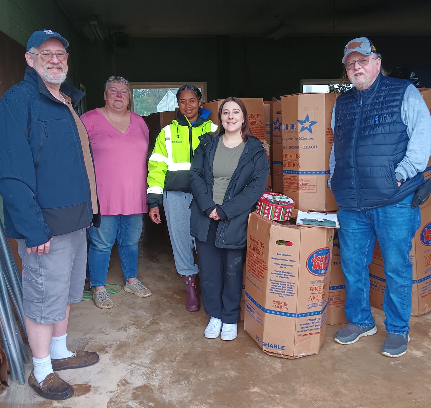 Our Wreaths have ARRIVED!!!! Big Thank you to the girls from MTM Trucking - you guys Rock! Also Past Commanders Cormac J Quinn &amp; Harry Johnson from the American Legion, and Missy Walls from Edge Hill Cemetery for your assistance in unloading 105 boxes (1, 260 wreaths) in the rain! AND a special Thank you to Char Fraysier for supplying a tin of homemade Christmas Cookies for the transport team.