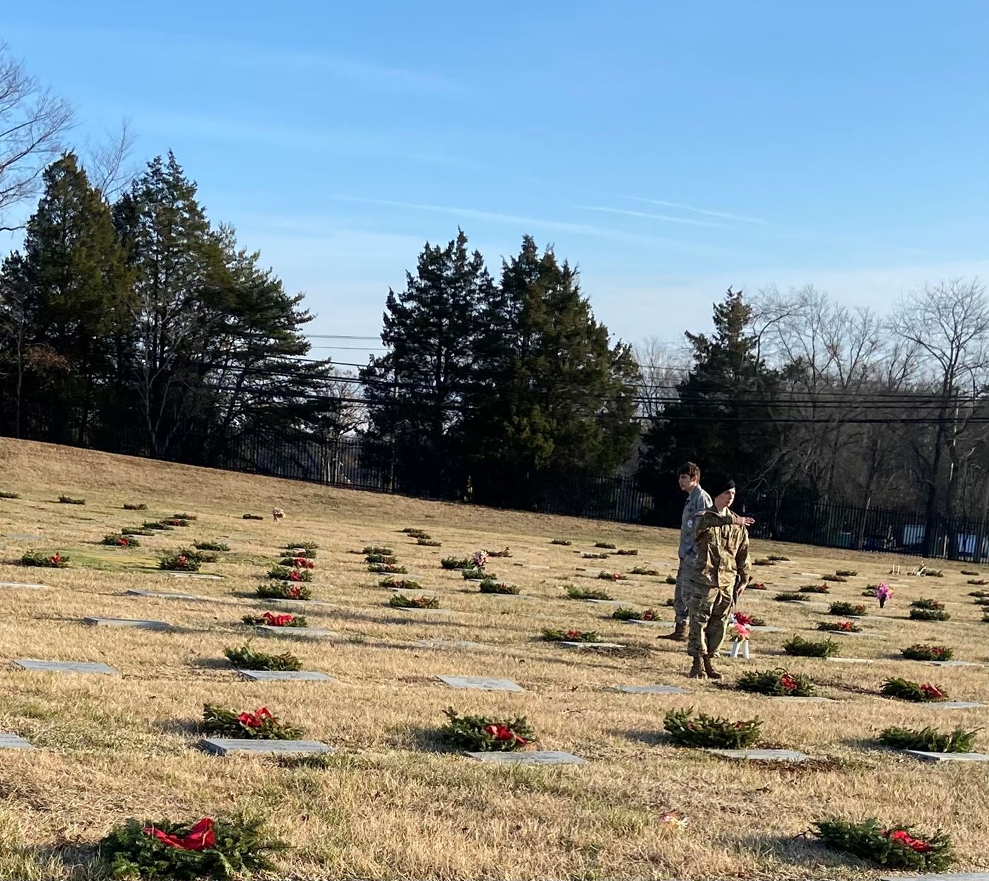 Placing wreath and honoring our veterans.