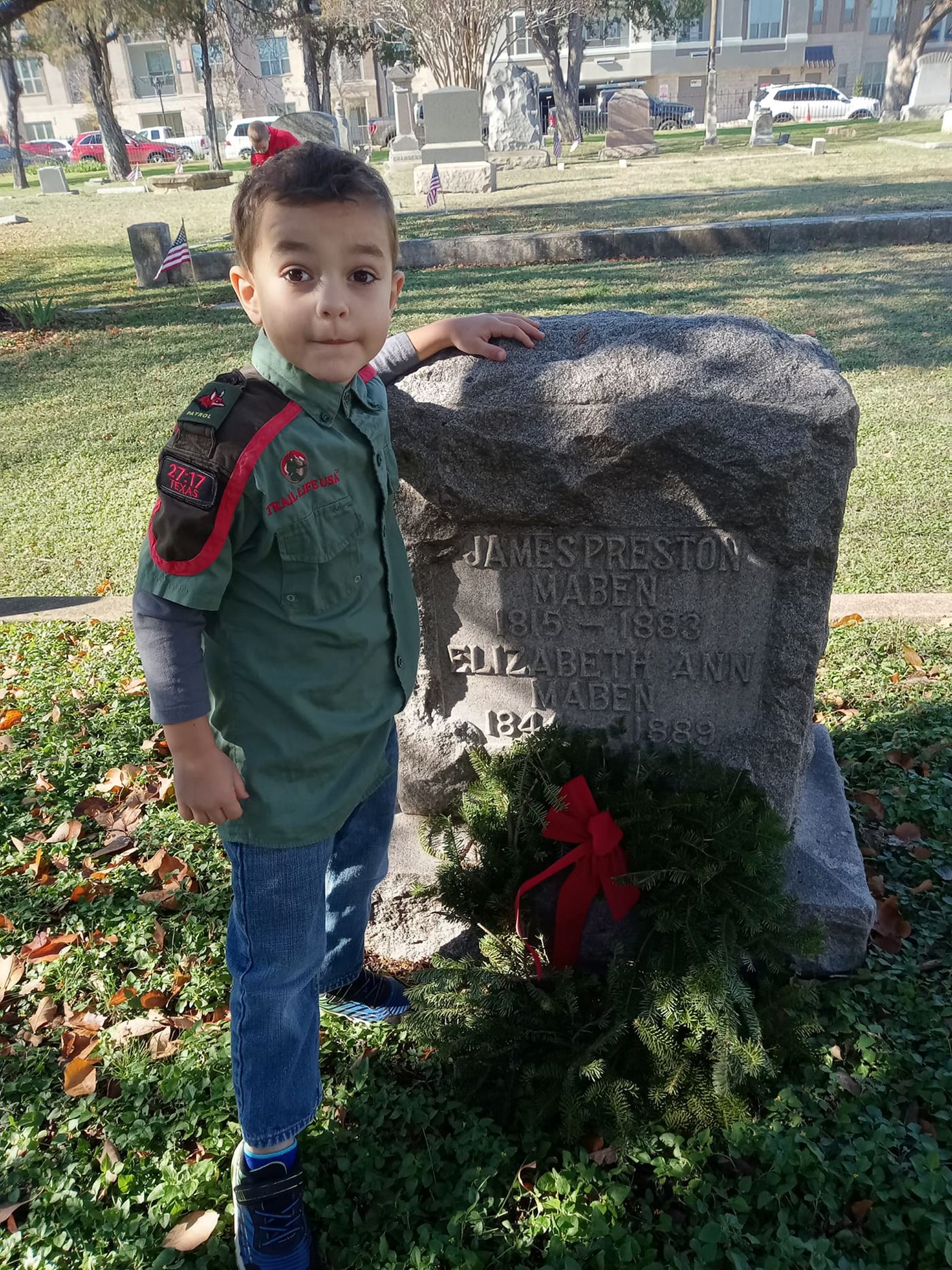 Placing a wreath.