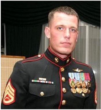 <i class="material-icons" data-template="memories-icon">card_giftcard</i><br/>GYSGT Aaron Michael Kenefick, Marine Corps<br/><div class='remember-wall-long-description'>In honor and appreciation of his stellar career as a leader, humanitarian, Marine of the Year twice in his 12-year career, as well as, earning two Purple Hearts and a Bronze Star. Aaron Michael Kenefick paid the ultimate sacrifice in Kunar Province, Afghanistan on September 8, 2009. Aaron, you will never be forgotten.</div><a class='btn btn-primary btn-sm mt-2 remember-wall-toggle-long-description' onclick='initRememberWallToggleLongDescriptionBtn(this)'>Learn more</a>