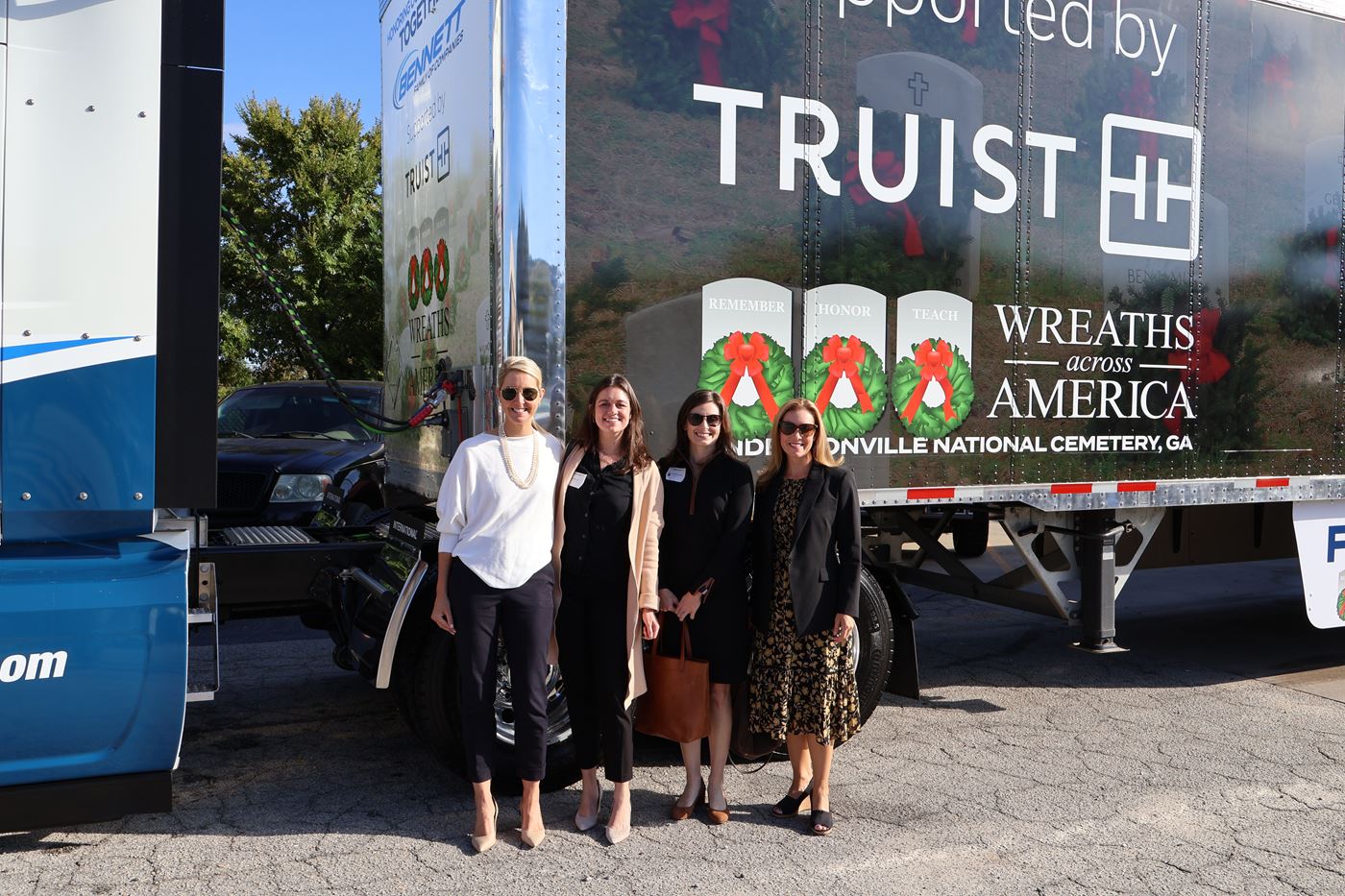 Members of Truist Stand in Front of New Trailer to Support Wreaths Across America