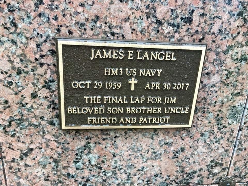 <i class="material-icons" data-template="memories-icon">account_balance</i><br/>Jim Langel, Navy<br/><div class='remember-wall-long-description'>We remember Jim Langel of Luck, Wis. Kind with a dry sense of humor. Knew everything about sports but was humble about it. Great son, brother, uncle, friend and patriot</div><a class='btn btn-primary btn-sm mt-2 remember-wall-toggle-long-description' onclick='initRememberWallToggleLongDescriptionBtn(this)'>Learn more</a>