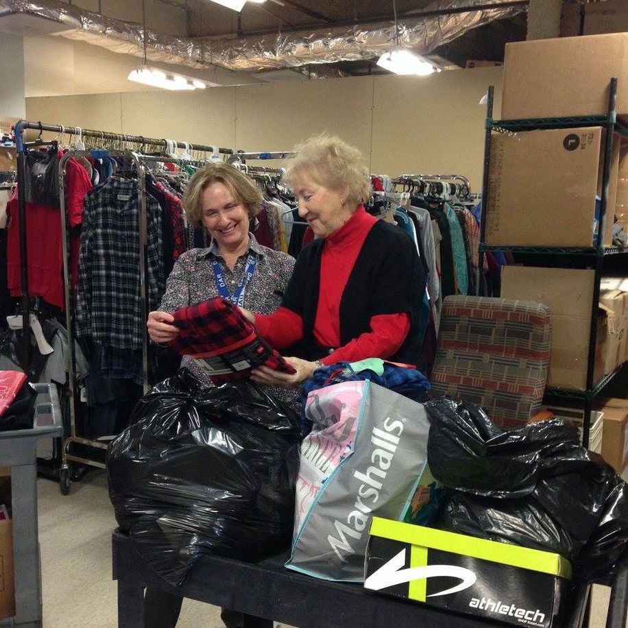 Jersey Blues run a clothing distribution room at the Menlo Park Veterans' Home. The clothing is all new and donated by various groups for the use and comfort of the veteran residents. Enthusiastic Jersey Blue volunteers sorted and packed items into holiday gift bags for residents during the holiday season.