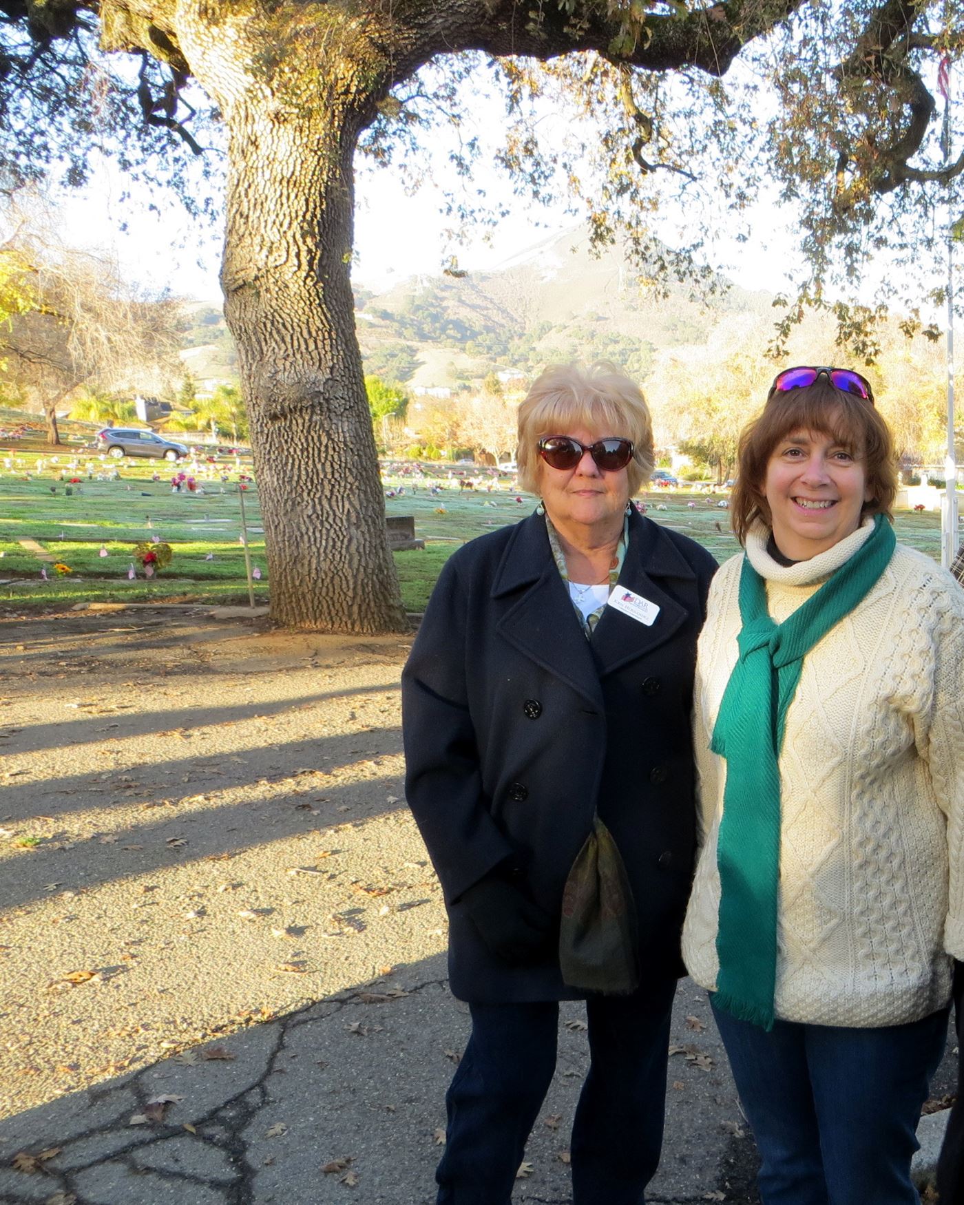 Some years are warmer and more sunny than others, but Gabilan Chapter DAR has been present and proud to honor veterans at every Wreaths Across America since it first came to Morgan Hill.
Kris Hernandez (left) with Elizabeth Krafft
Mt. Hope Cemetery, Morgan Hill, California
2015