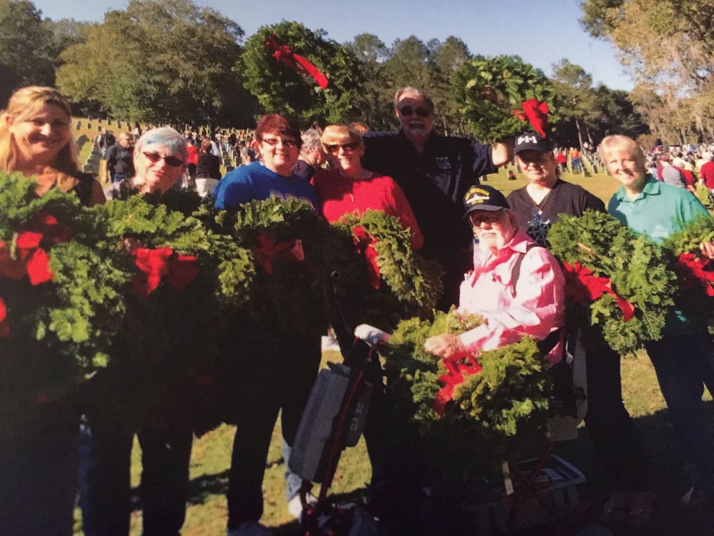 Members of the Pilot Club of St Lucie County laying wreaths at the 2015 WAA ceremony 