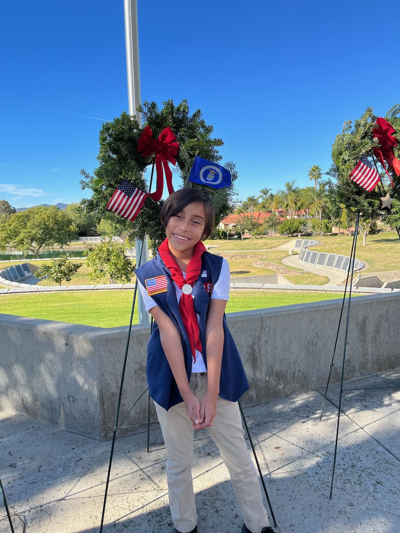 Sofia standing in front of the Air Force Wreath