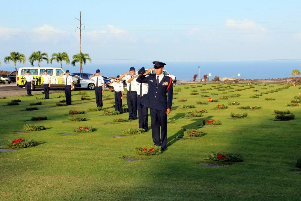 Cadets of the Kona Composite Squadron Civil Air Patrol honor the veterans laid to rest at West Hawaii Veterans Cemetery.