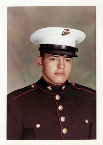 <i class="material-icons" data-template="memories-icon">message</i><br/>Raul Pazmino, Marine Corps<br/><div class='remember-wall-long-description'>He is sadly missed this holiday season by his family and friends with his jolly spirit, his big heart and a smile that could warm up the room. He was always there for his family, graciously lending a helping hand to anyone who needed it. We are happy to honor him during this special time for Wreaths Across America.</div><a class='btn btn-primary btn-sm mt-2 remember-wall-toggle-long-description' onclick='initRememberWallToggleLongDescriptionBtn(this)'>Learn more</a>