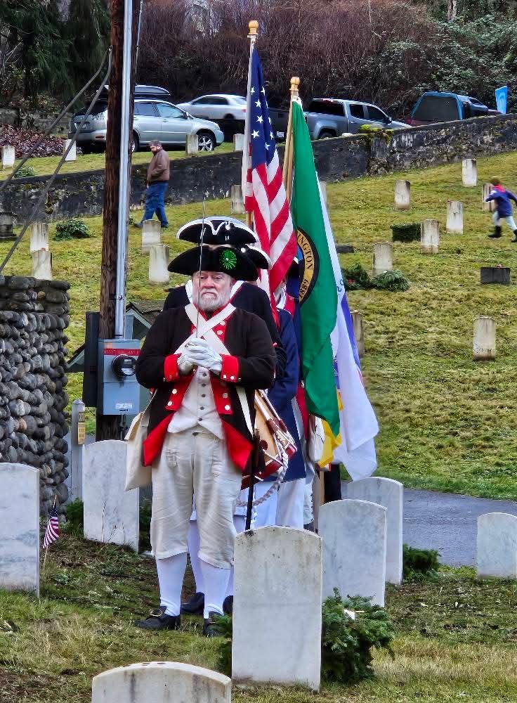 John Herr, of the Alexander Hamilton Chapter of the Sons of the American Revolution,&nbsp; lead the Color Guard at the opening of the 2024 Wreaths Across America Ceremony at the WA Soldier's Home Cemetery in Orting,&nbsp; WA.&nbsp;