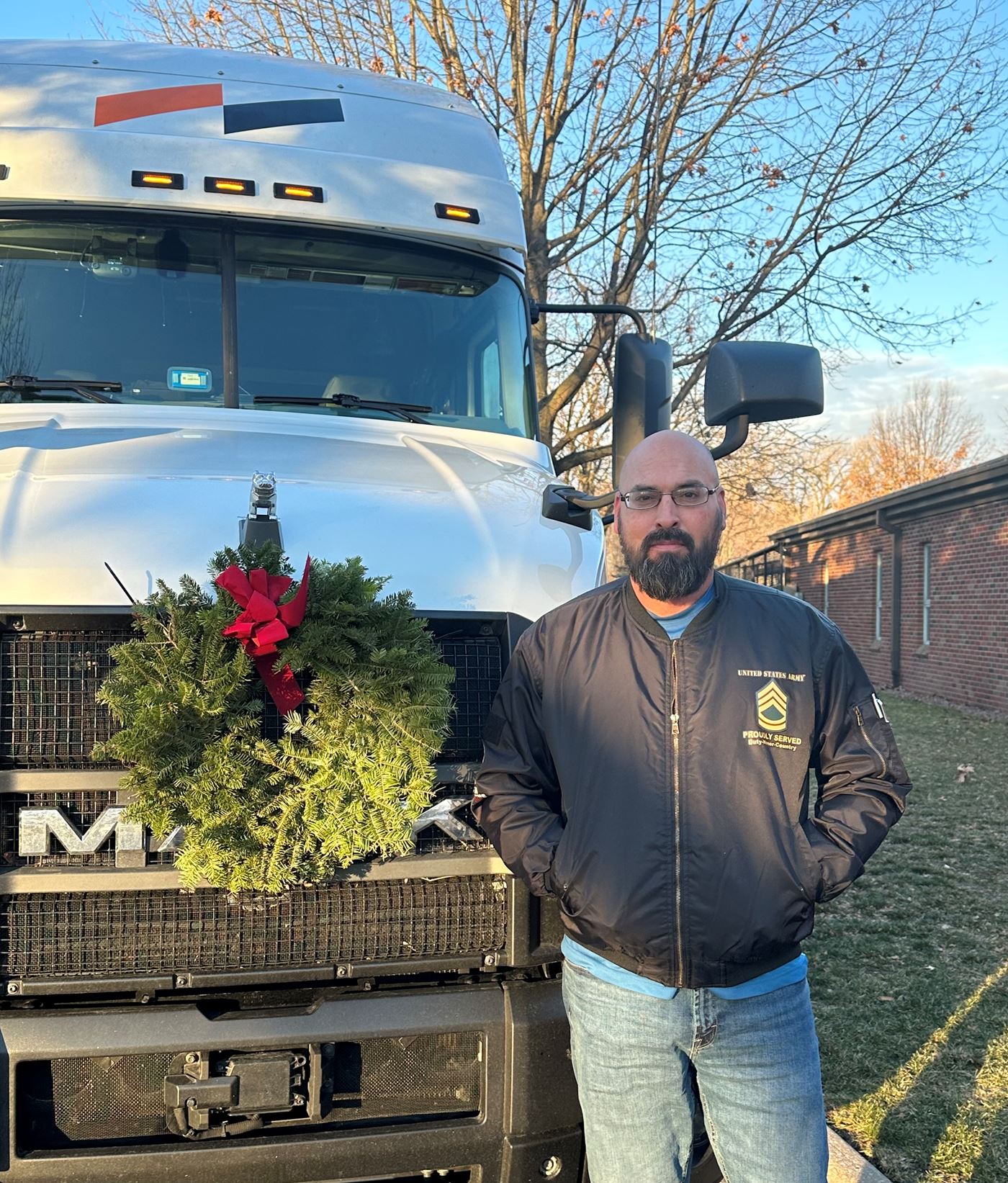 Michael, a veteran and driver for Day &amp; Ross USA, Inc. delivered our 3,600 wreaths to the RI Cemetery.&nbsp; Thank you to both Michael and Day &amp; Ross for volunteering to deliver our wreaths from the State of Maine.&nbsp; THANK YOU!