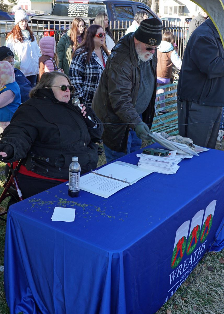 Location Coordinator, Anne Quinn, serves as Ceremony Announcer.