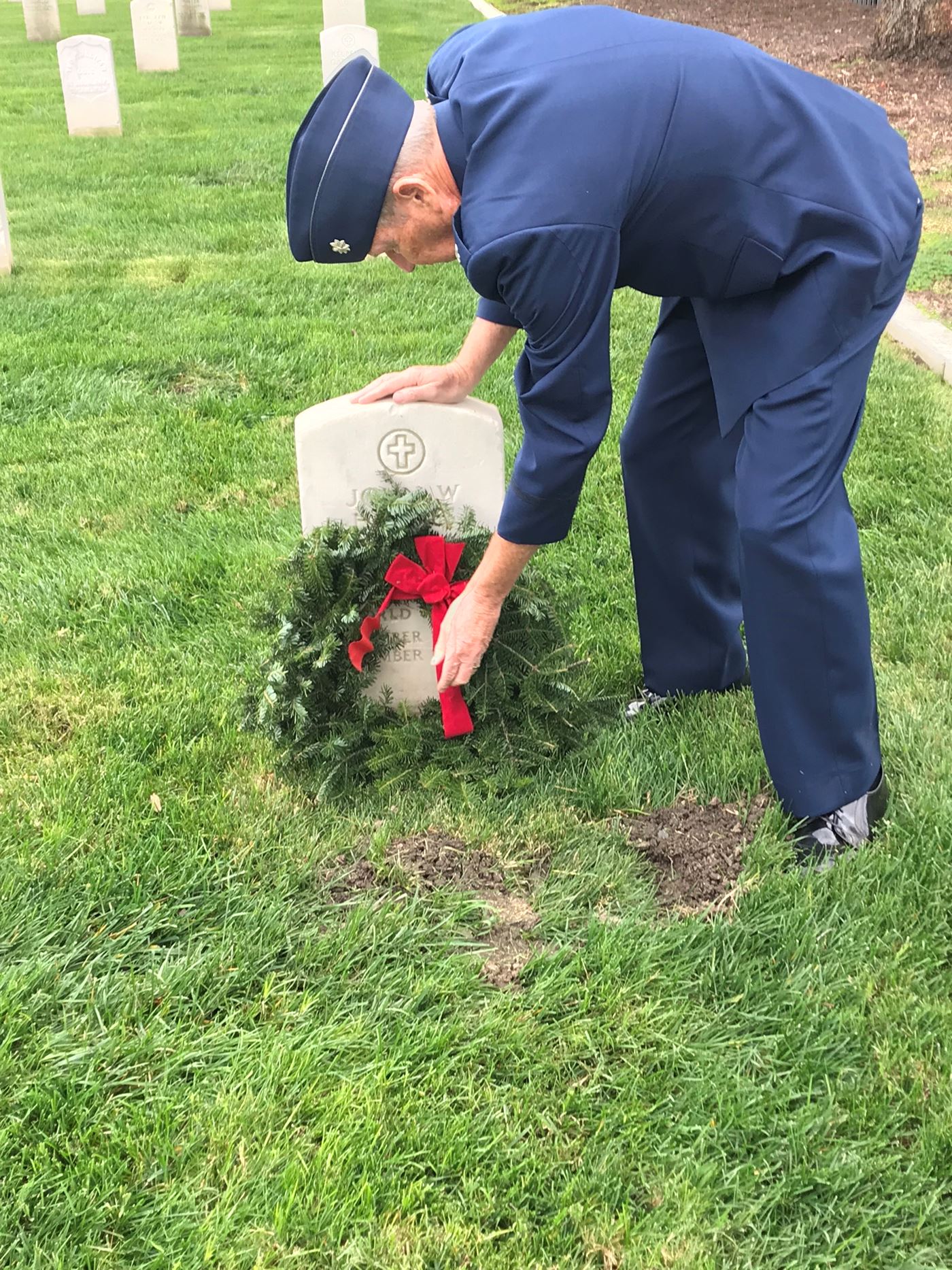 placing a wreath for family