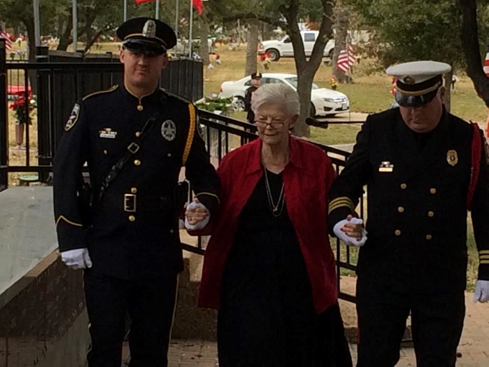 Sally Hendricks placing the US Army wreath in memory of her husband, Dr. William Hendricks who served as a medic during the Korean War.