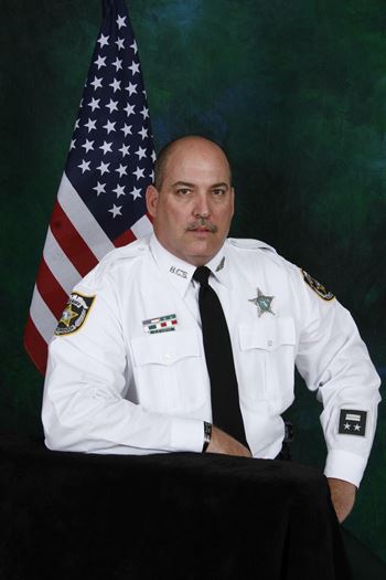 <i class="material-icons" data-template="memories-icon">account_balance</i><br/>Bryan Custer<br/><div class='remember-wall-long-description'>Bryan Custer - Retired after 21 years in Law Enforcement. We are so proud of you.</div><a class='btn btn-primary btn-sm mt-2 remember-wall-toggle-long-description' onclick='initRememberWallToggleLongDescriptionBtn(this)'>Learn more</a>