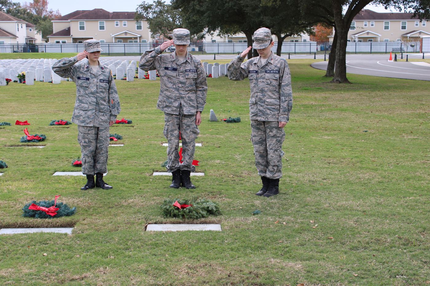 Honoring our heroes with respect and remembrance. Civil Air Patrol cadets standing tall, united in their mission to honor veterans this holiday season.