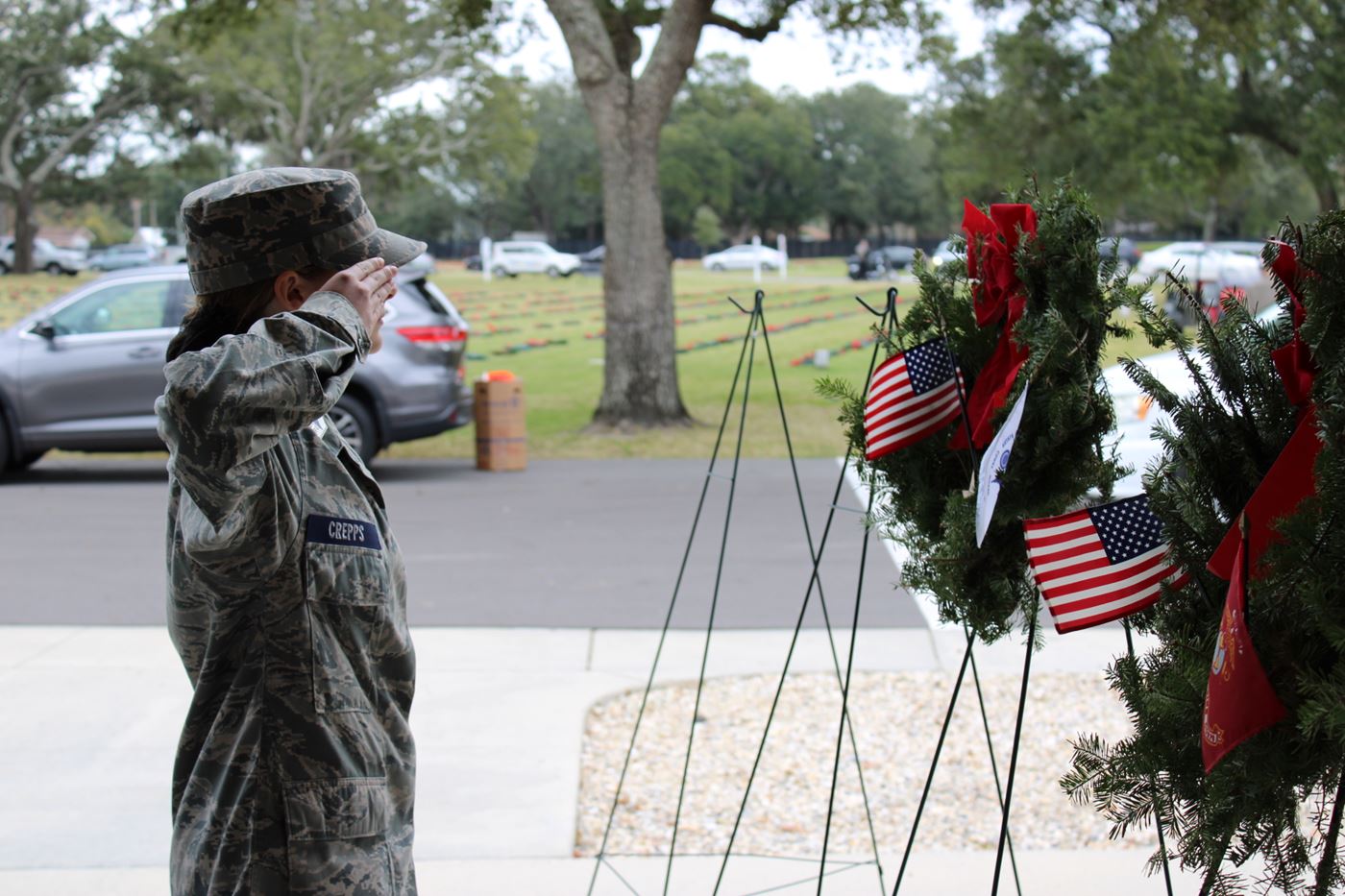 A salute to our heroes. Cadet Crepps stands in solemn honor, representing the next generation dedicated to serving our country.