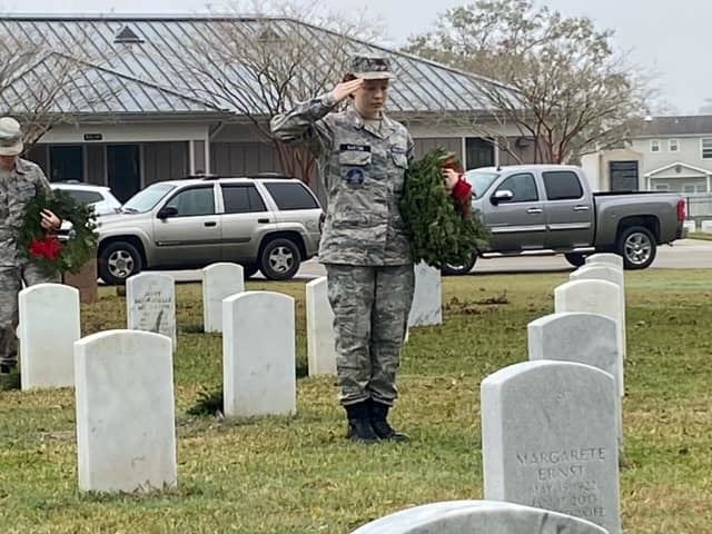 Each wreath laid with care and respect, a lasting tribute to those who served.