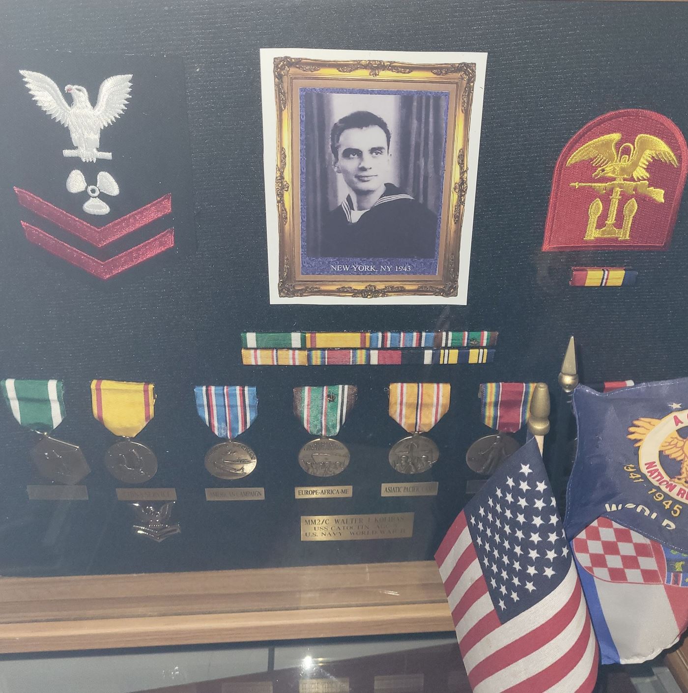 <i class="material-icons" data-template="memories-icon">account_balance</i><br/>Walter  Kolibas, Navy<br/><div class='remember-wall-long-description'>Walter Kolibas, USN, PO2, 
WWII decorated service and proud defender of our freedom.</div><a class='btn btn-primary btn-sm mt-2 remember-wall-toggle-long-description' onclick='initRememberWallToggleLongDescriptionBtn(this)'>Learn more</a>