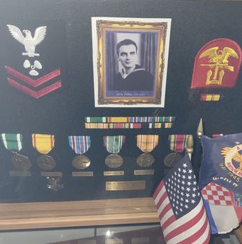 <i class="material-icons" data-template="memories-icon">account_balance</i><br/>Walter  Kolibas, Navy<br/><div class='remember-wall-long-description'>Walter Kolibas, USN, PO2, 
WWII decorated service and proud defender of our freedom.</div><a class='btn btn-primary btn-sm mt-2 remember-wall-toggle-long-description' onclick='initRememberWallToggleLongDescriptionBtn(this)'>Learn more</a>