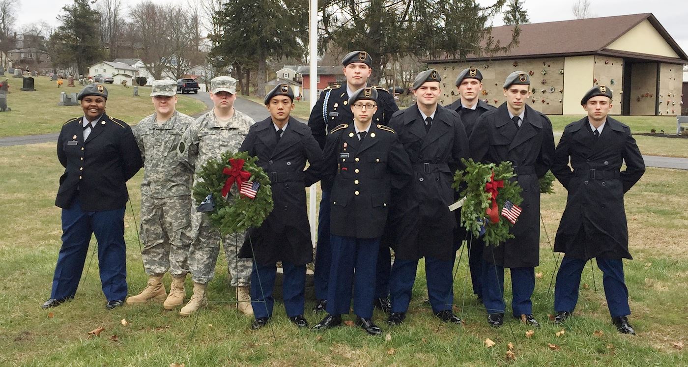 JROTC Cadets placed wreaths around the flagpole at High Lawn Memorial Park as part of the 2016 WAA Dedication Ceremony