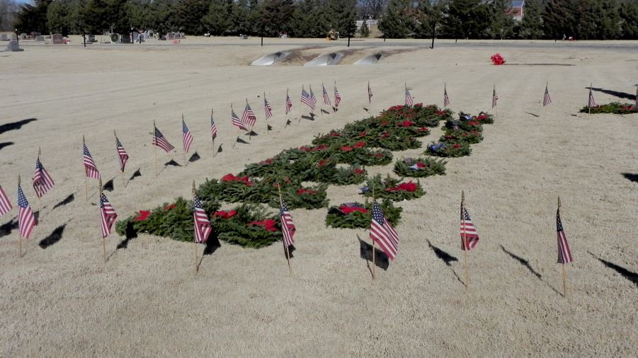 Seven Ceremonial Wreaths and Veterans Wreaths prepared for ceremony.