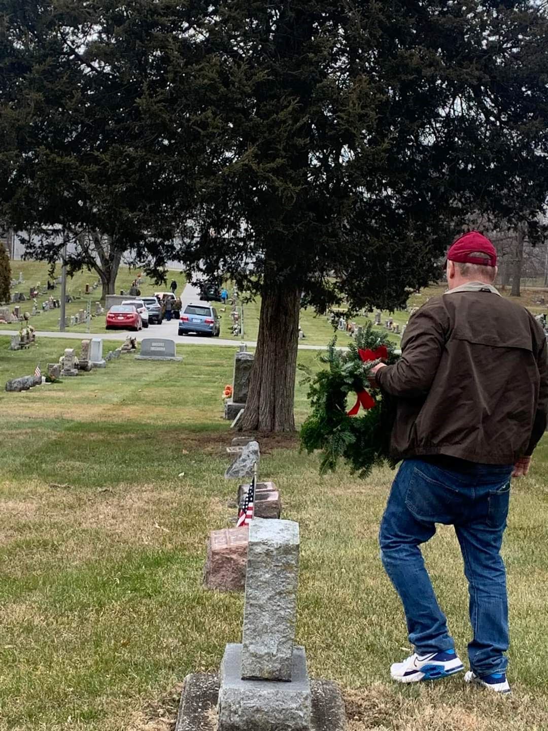 Individual looking to place wreath at a veteran gravesite<br>